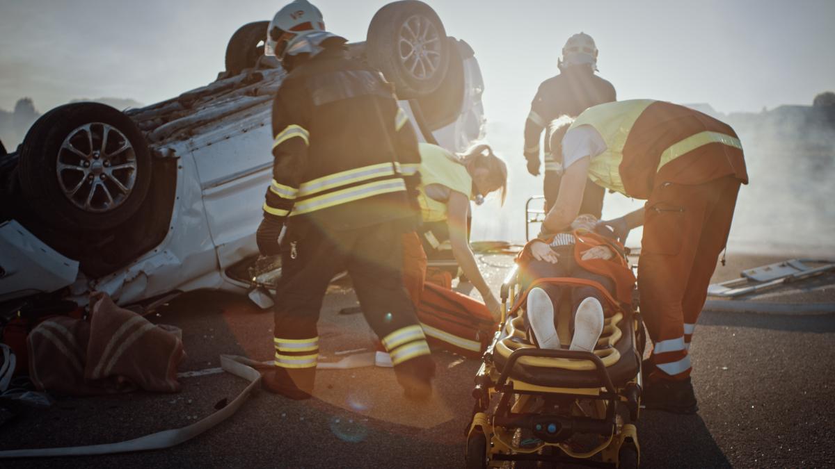 Accident Victim and EMTs